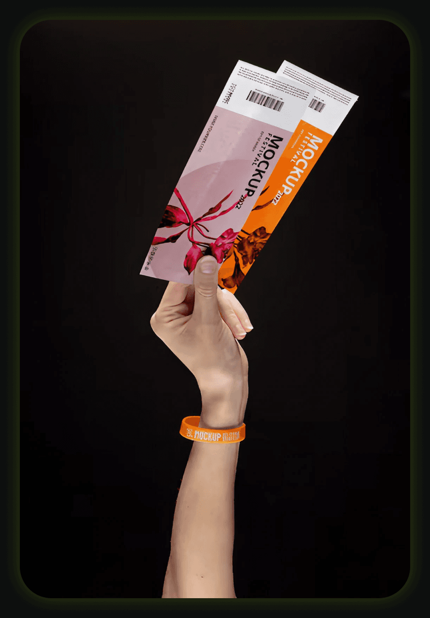 A hand holding event tickets